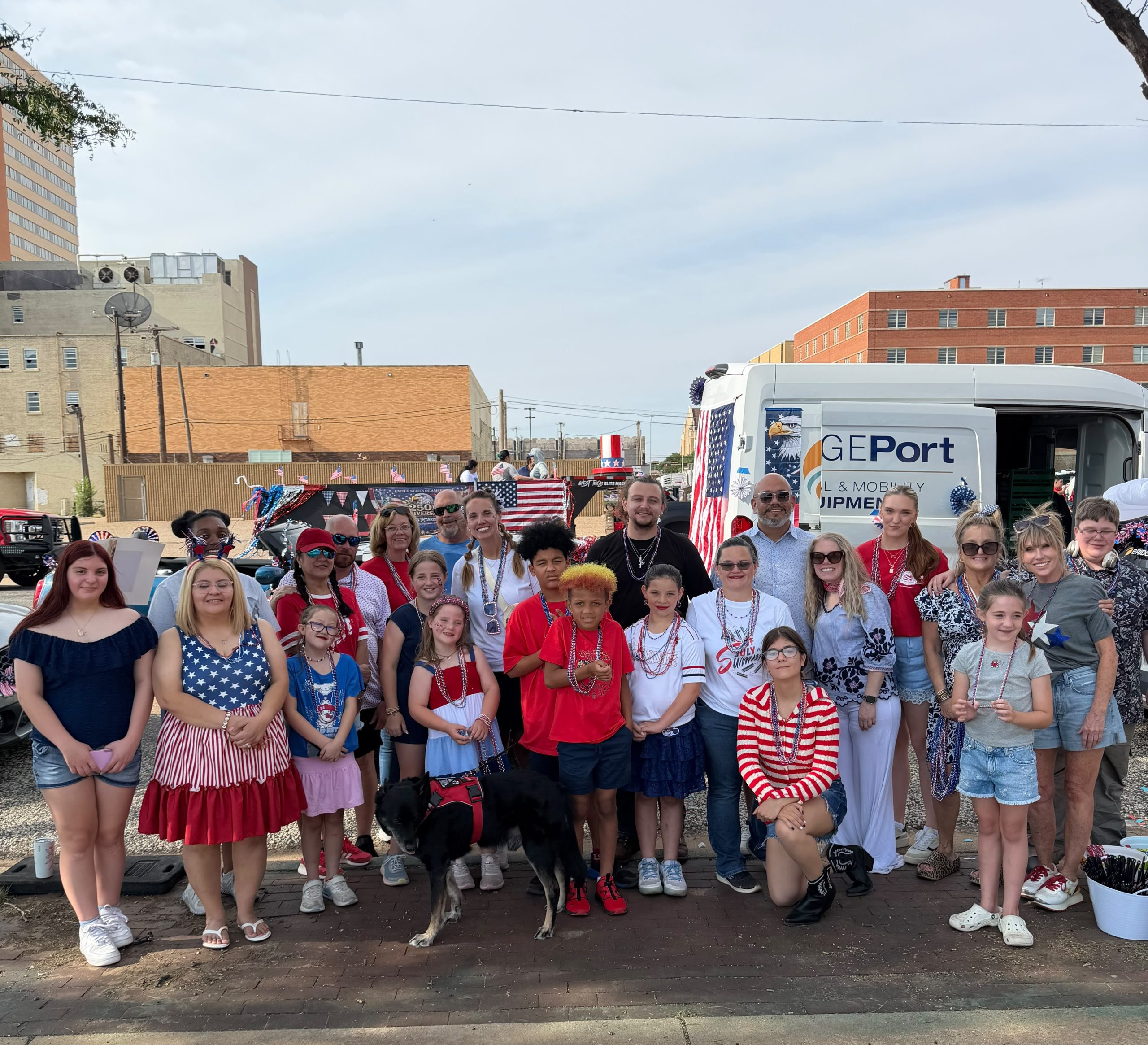 Bridge Team poses at July 4th on Broadway Parade in Lubbock. Bridge loves to support the community