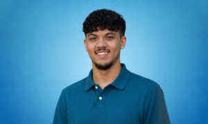 Bridge Hospice Office Assistant in blue polo